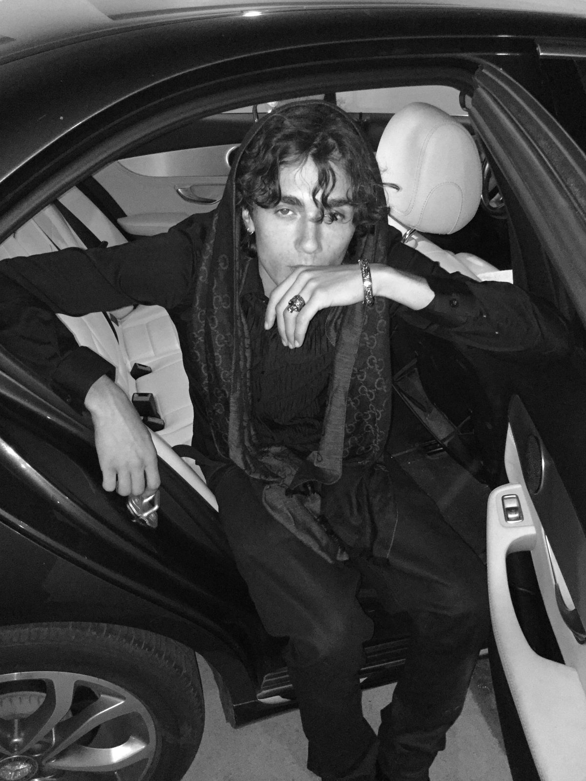 BR!X sitting in a car, still from the Dancing Alone music video directed by Dylan Bieber